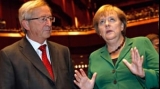 Preşedintele Comisiei Europene Jean-Claude Juncker a lăudat-o pe cancelarul german Angela 