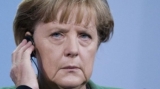 Angela Merkel a exprimat optimism că situaţia se poate rezolva prin compromisuri de ordin politic