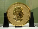 Monedă din aur, de 100 de kg