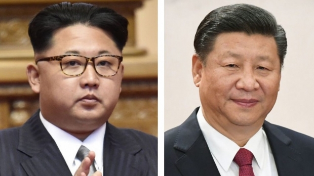 Xi Jinping și  Kim Jong 