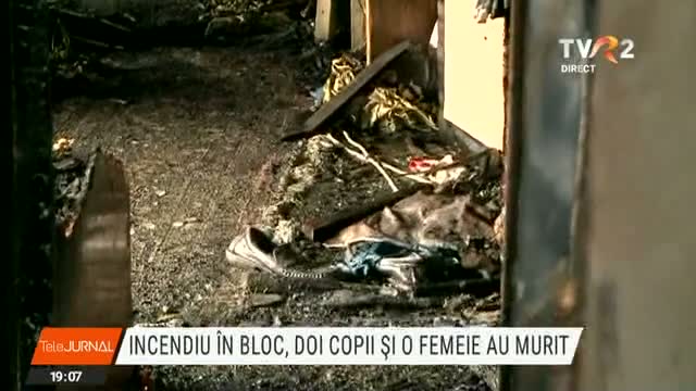 O femeie și doi copii au murit într-un incendiu în bloc 